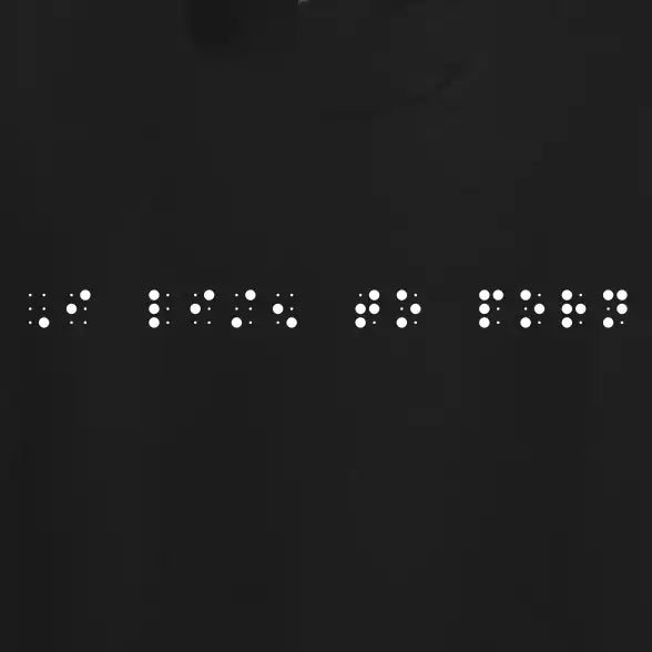 "I listen to porn" printed in white Grade 2 braille across the chest of a black t-shirt.